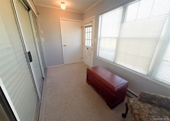 Property Slideshow image 3 of 13 | 423 woodbridge dr b, Ridge, NY, 11961