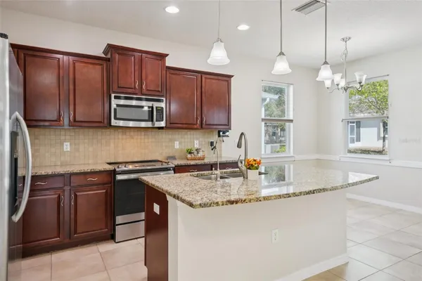 Property Slideshow image 3 of 41 | 11129 kiskadee cir, New Port Richey, FL, 34654
