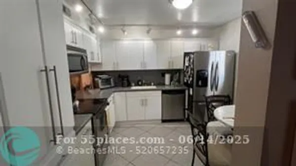 Property Slideshow image 2 of 9 | 4970 e sabal palm blvd 108, Tamarac, FL, 33319