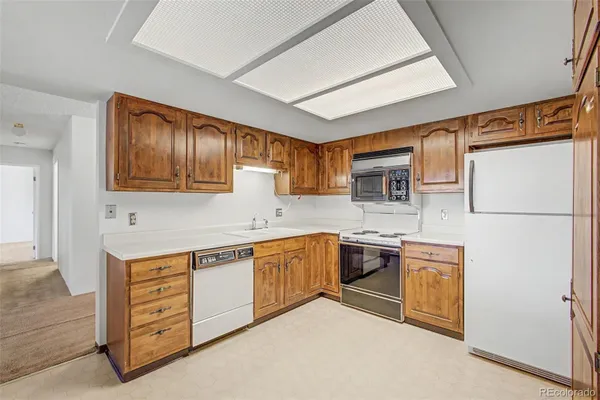 Property Slideshow image 2 of 45 | 2868 s heather gardens way 210, Aurora, CO, 80014