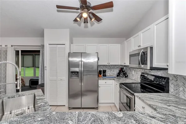 Property Slideshow image 3 of 43 | 5556 grove mnr, Lady Lake, FL, 32159