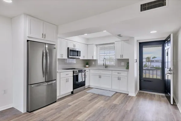 Property Slideshow image 2 of 29 | 102 46th avenue ter w apt 402, Bradenton, FL, 34207