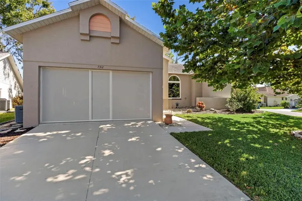 Property Slideshow image 2 of 64 | 7312 bottle brush dr, Spring Hill, FL, 34606