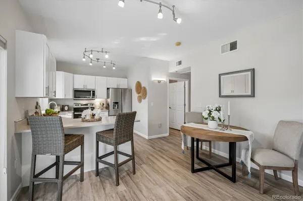 Property Slideshow image 3 of 49 | 2895 w riverwalk cir 101, Littleton, CO, 80123