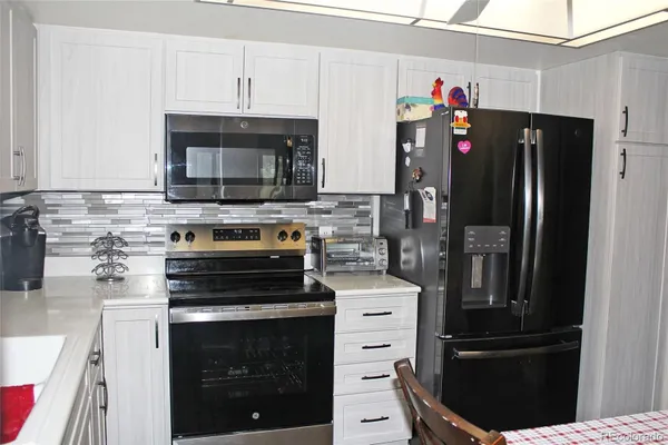 Property Slideshow image 2 of 26 | 14050 e linvale pl 209, Aurora, CO, 80014