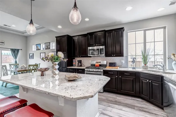 Property Slideshow image 3 of 50 | 5519 genoa st, Denver, CO, 80249