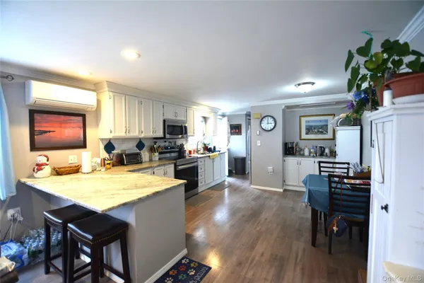 Property Slideshow image 2 of 31 | 77 village cir, Manorville, NY, 11949
