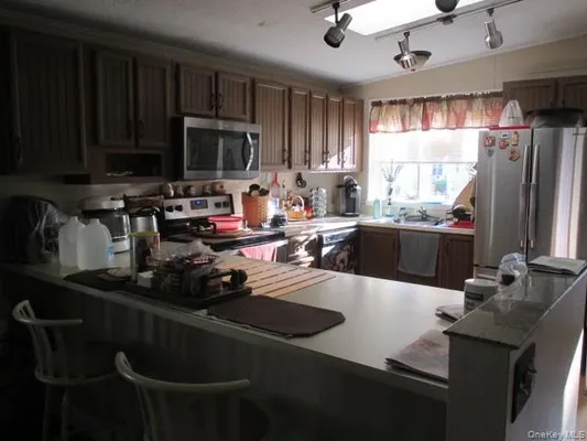 Property Slideshow image 3 of 14 | 130 village cir, Brookhaven, NY, 11949