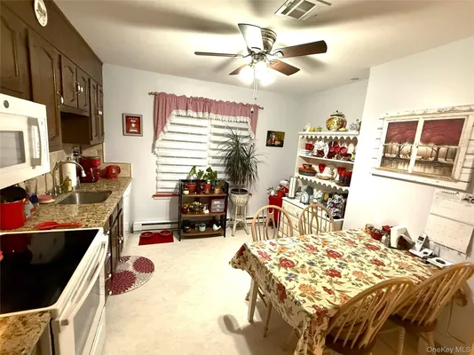 Property Slideshow image 3 of 16 | 418 weymouth ct c, Ridge, NY, 11961