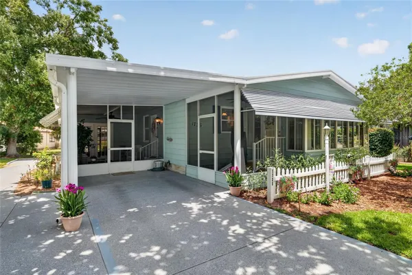 Property Slideshow image 2 of 64 | 1736 pebble beach ln, The Villages, FL, 32159