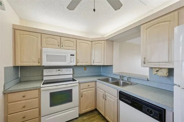 Property Slideshow image 3 of 59 | 7425 bay island dr 203, South Pasadena, FL, 33707