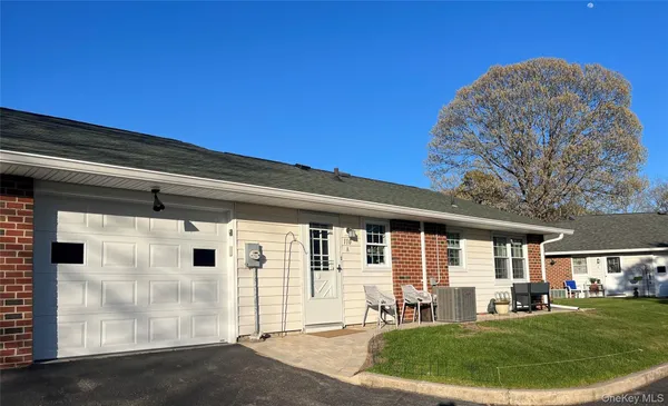 Property Slideshow image 2 of 3 | 110 exmore ct a, Brookhaven, NY, 11961