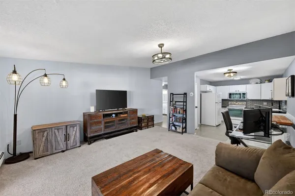 Property Slideshow image 2 of 34 | 3184 s heather gardens way 408, Aurora, CO, 80014