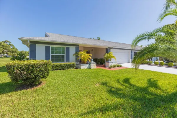 Property Slideshow image 2 of 40 | 8423 pebble dr, Port Richey, FL, 34668