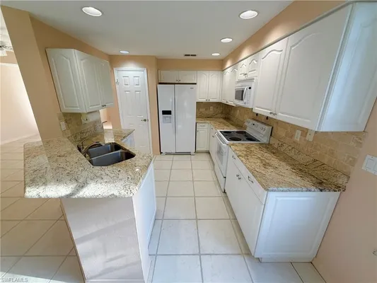 Property Slideshow image 3 of 28 | 27021 oakwood lake dr 101, Bonita Springs, FL, 34134