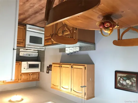 Property Slideshow image 2 of 13 | 405 woodbridge dr d, Ridge, NY, 11961