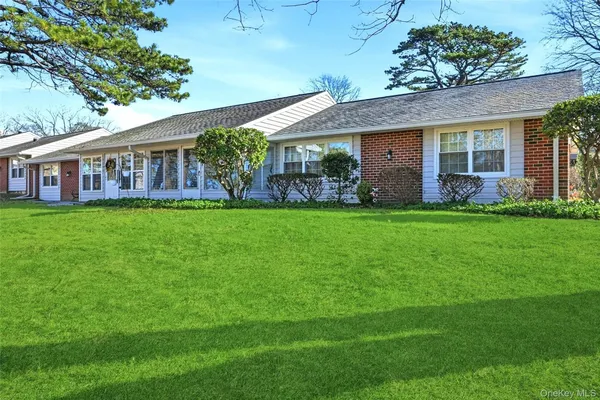 Property Slideshow image 2 of 45 | 128 exmore ct unit d, Ridge, NY, 11961