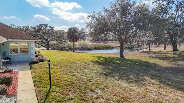 Property Slideshow image 2 of 45 | 11431 dollar lake dr 1, Port Richey, FL, 34668