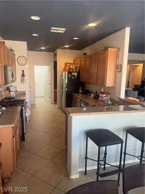 Property Slideshow image 2 of 12 | 7464 chipping sparrow st, North Las Vegas, NV, 89084