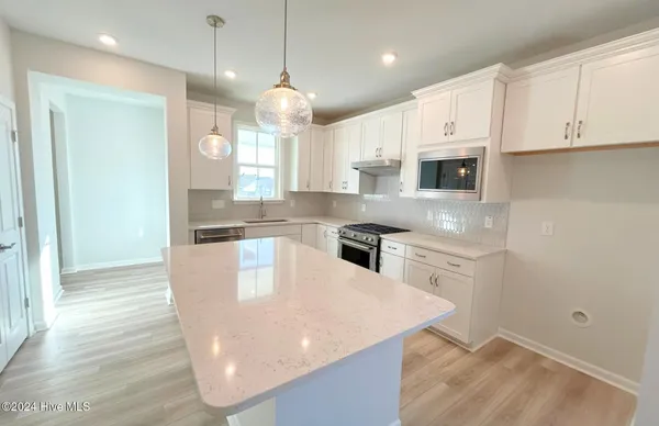 Property Slideshow image 3 of 41 | 5047 meadow buttercup ct 212g, Leland, NC, 28479