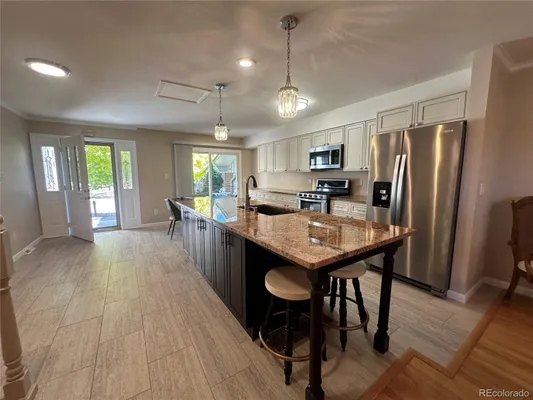 Property Slideshow image 3 of 4 | 7433 w cedar cir, Lakewood, CO, 80226