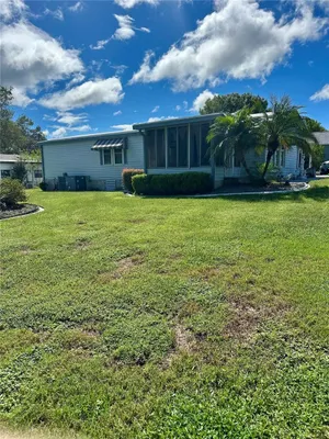 Property Slideshow image 3 of 37 | 1701 palm aire dr, The Villages, FL, 32159