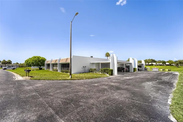 Property Slideshow image 3 of 22 | 11210 carriage hill dr 6, Port Richey, FL, 34668