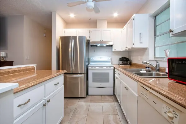 Property Slideshow image 3 of 55 | 2228 greenhaven dr 384, Sun City Center, FL, 33573