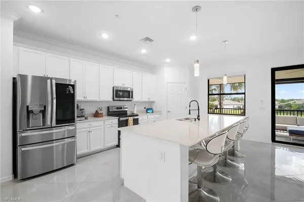 Property Slideshow image 2 of 37 | 11879 arboretum run dr 201, Fort Myers, FL, 33913