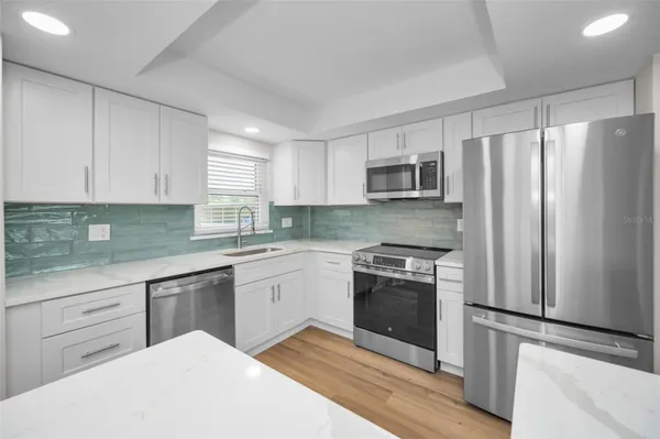 Property Slideshow image 3 of 47 | 4650 cove cir 105, St Petersburg, FL, 33708