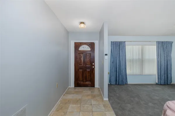 Property Slideshow image 3 of 38 | 8240 winding wood dr, Port Richey, FL, 34668