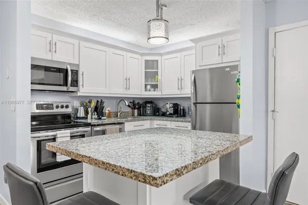 Property Slideshow image 2 of 20 | 10709 w clairmont cir 111, Tamarac, FL, 33321