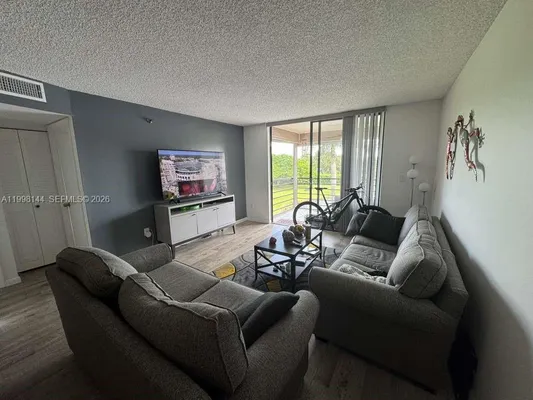 Property Slideshow image 2 of 24 | 1200 saint charles pl 321, Pembroke Pines, FL, 33026