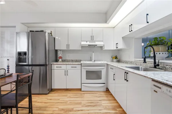 Property Slideshow image 2 of 39 | 12901 sw 15th ct 208v, Pembroke Pines, FL, 33027