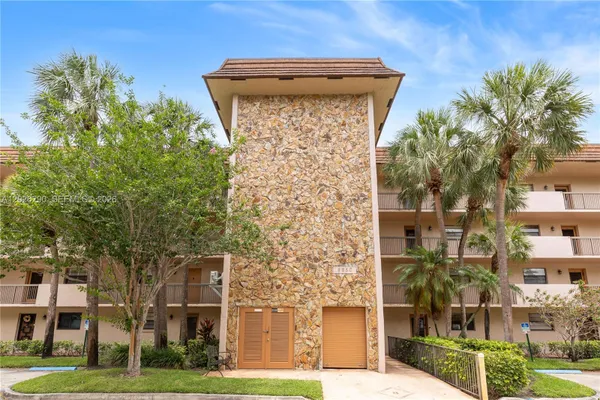 Property Slideshow image 2 of 42 | 4950 e sabal palm blvd 106, Tamarac, FL, 33319