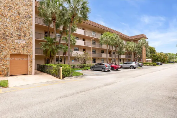 Property Slideshow image 3 of 42 | 4950 e sabal palm blvd 106, Tamarac, FL, 33319