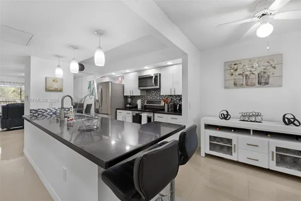 Property Slideshow image 2 of 34 | 900 sw 142nd ave 306l, Pembroke Pines, FL, 33027