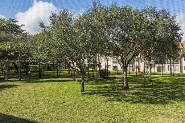 Property Slideshow image 3 of 23 | 6085 n sabal palm blvd 208, Tamarac, FL, 33319