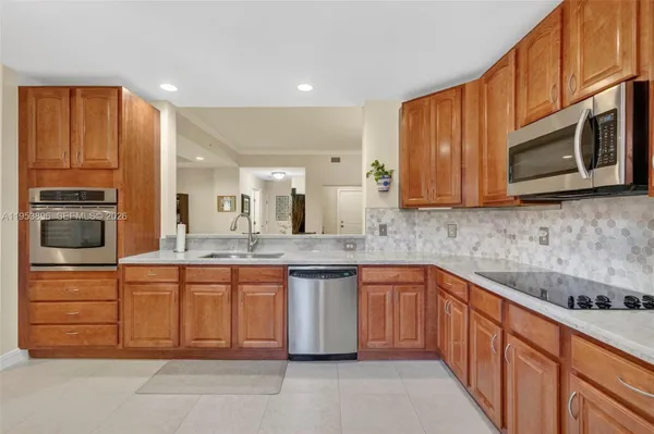 Property Slideshow image 3 of 57 | 16135 emerald estates dr 162, Weston, FL, 33331