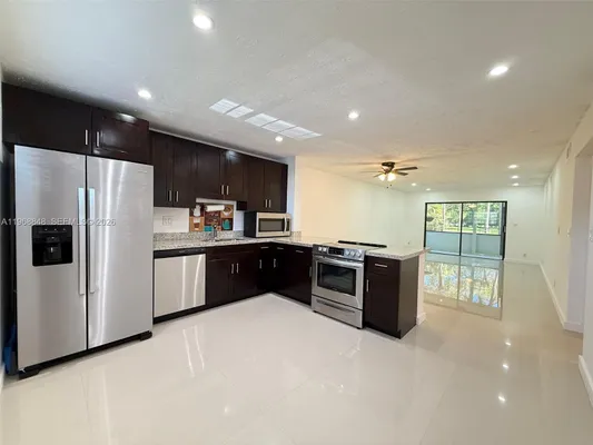 Property Slideshow image 3 of 45 | 6095 n sabal palm blvd 103, Tamarac, FL, 33319