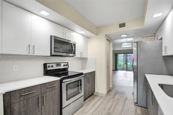 Property Slideshow image 2 of 37 | 12750 sw 4th ct 111j, Pembroke Pines, FL, 33027