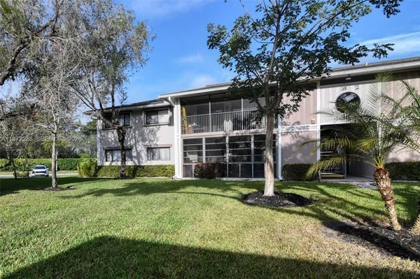 Property Slideshow image 3 of 19 | 10975 w clairmont cir 207, Tamarac, FL, 33321