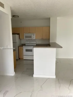 Property Slideshow image 2 of 3 | 7980 n nob hill rd 102, Tamarac, FL, 33321