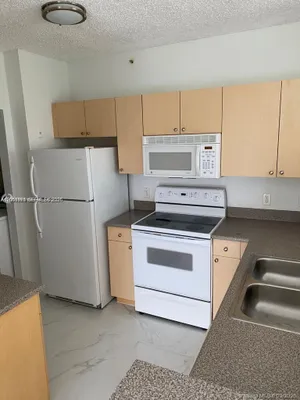 Property Slideshow image 3 of 3 | 7980 n nob hill rd 102, Tamarac, FL, 33321