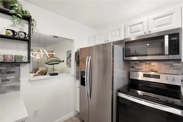 Property Slideshow image 2 of 38 | 6750 royal palm blvd 107e, Margate, FL, 33063