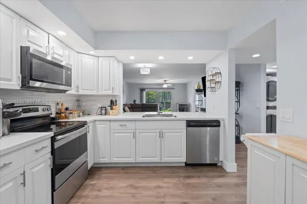 Property Slideshow image 2 of 40 | 12500 sw 5th ct 208m, Pembroke Pines, FL, 33027