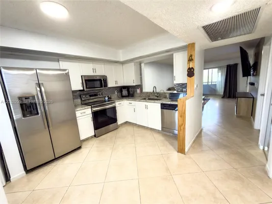 Property Slideshow image 3 of 25 | 1200 sw 137th ave 305e, Pembroke Pines, FL, 33027