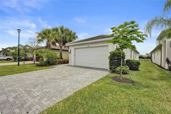 Property Slideshow image 3 of 70 | 13328 sw river rock rd, Port St. Lucie, FL, 34987
