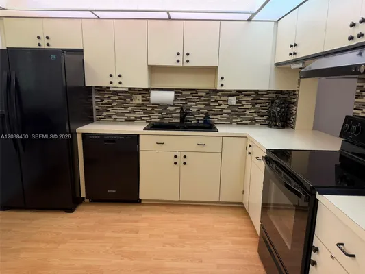 Property Slideshow image 2 of 49 | 4960 e sabal palm blvd 308, Tamarac, FL, 33319