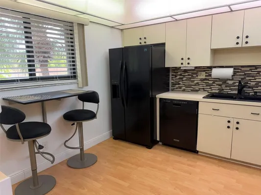 Property Slideshow image 3 of 49 | 4960 e sabal palm blvd 308, Tamarac, FL, 33319